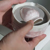 Blush Pink Matcha Set – 5 Piece Japanese Tea Ceremony Kit video showing unboxing  of ceramic bowl, metal strainer, bamboo whisk and spoon. 